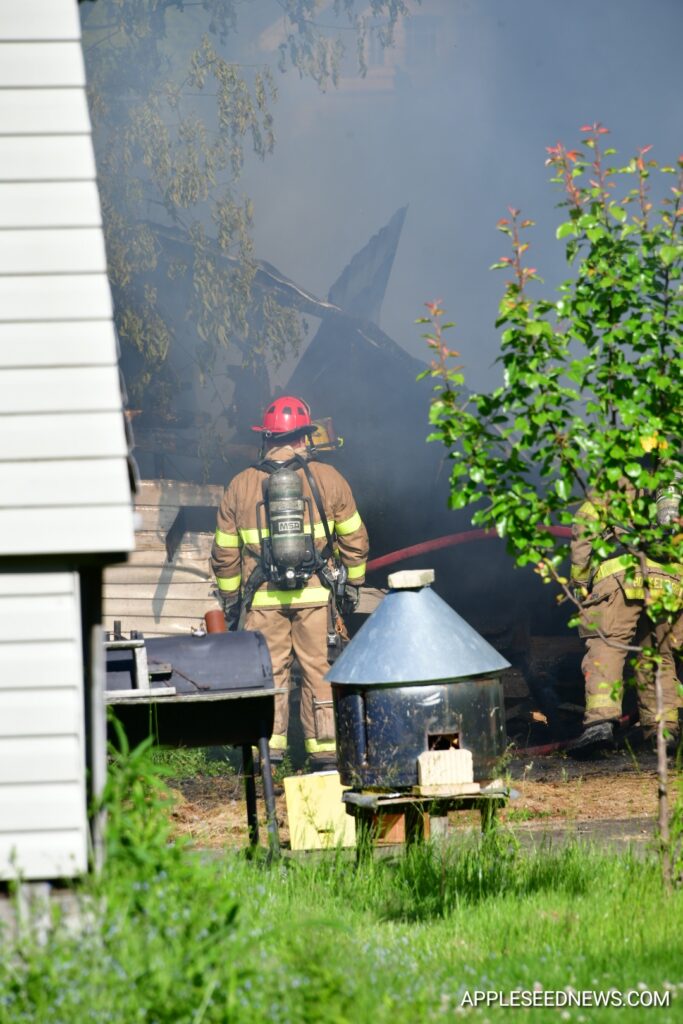 Fire Destroys Garage and Boat on Helen Avenue; Investigation Underway 13