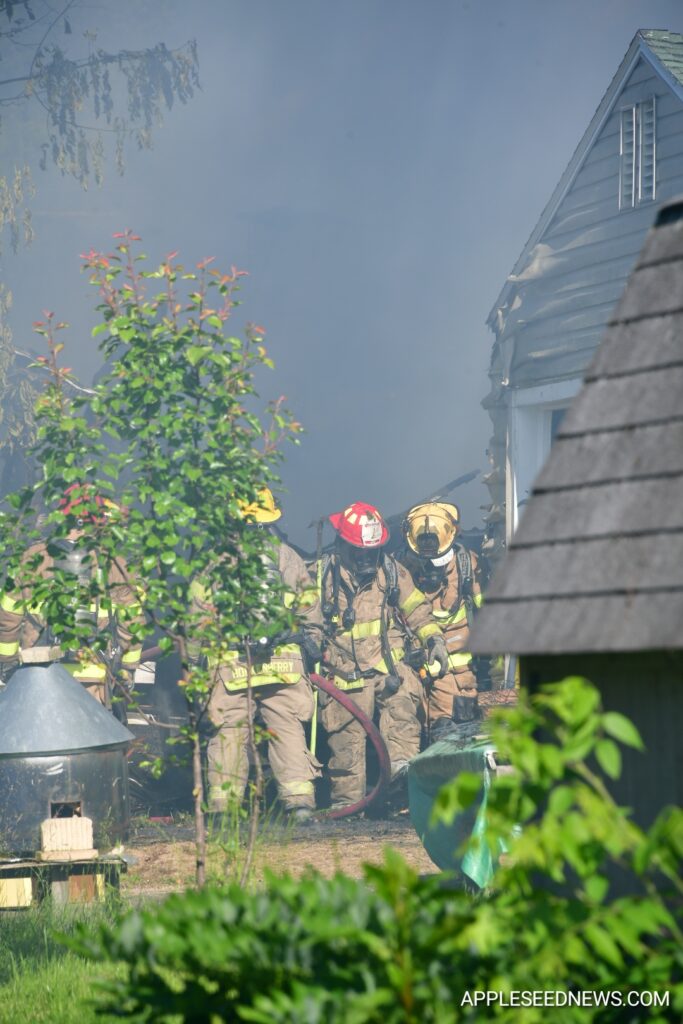 Fire Destroys Garage and Boat on Helen Avenue; Investigation Underway 12