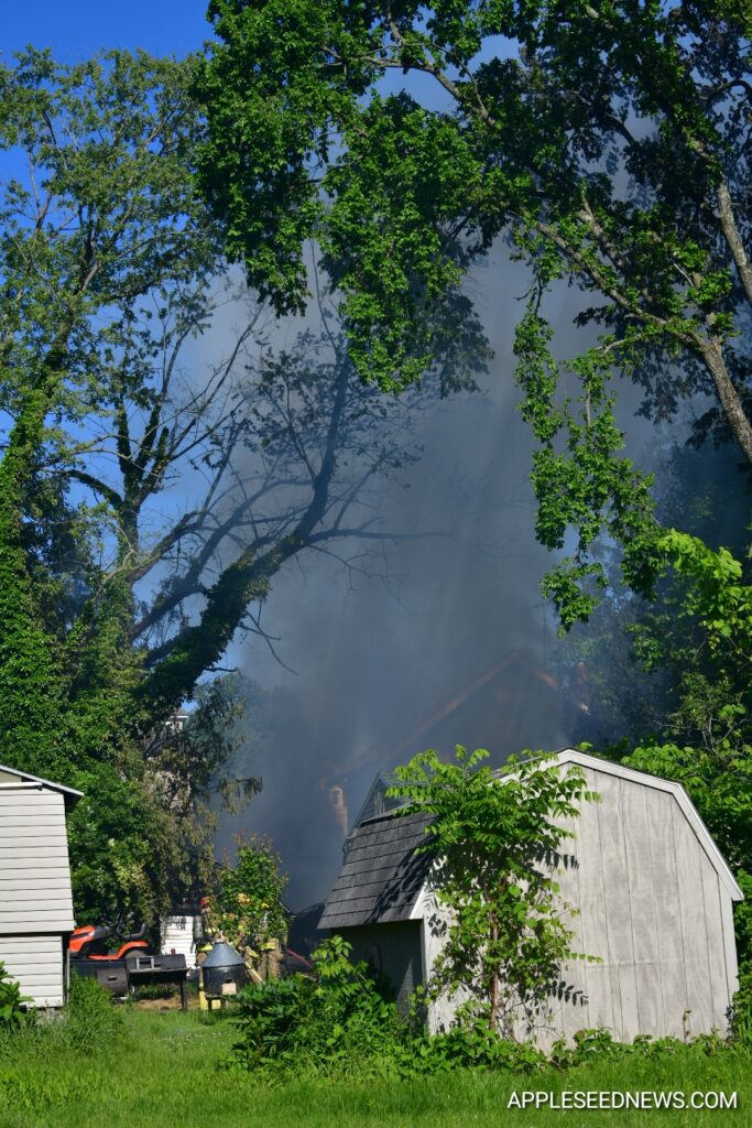 Fire Destroys Garage and Boat on Helen Avenue; Investigation Underway 10
