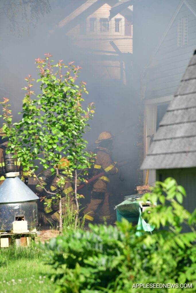 Fire Destroys Garage and Boat on Helen Avenue; Investigation Underway 9