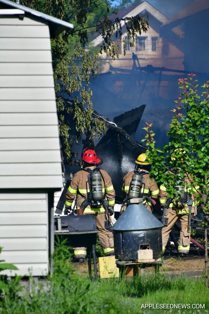 Fire Destroys Garage and Boat on Helen Avenue; Investigation Underway 1