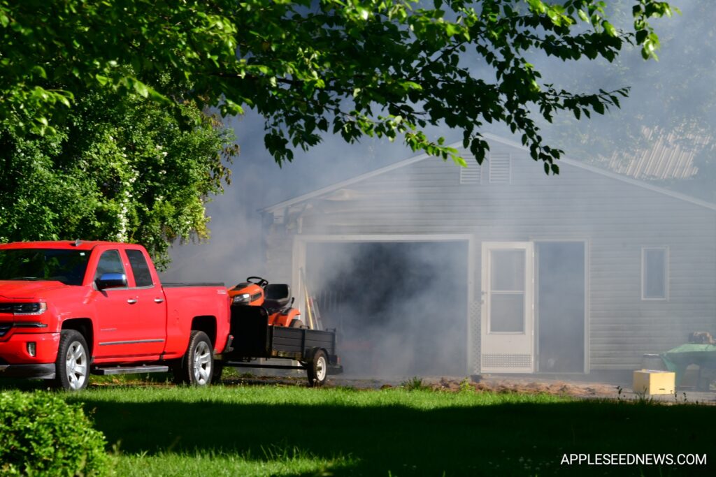 Fire Destroys Garage and Boat on Helen Avenue; Investigation Underway 2