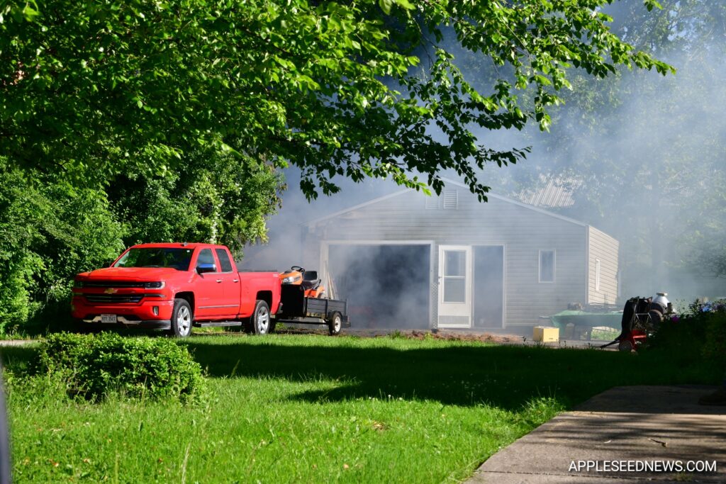 Fire Destroys Garage and Boat on Helen Avenue; Investigation Underway 3