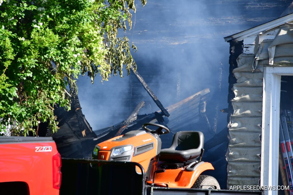 Fire Destroys Garage and Boat on Helen Avenue; Investigation Underway 4