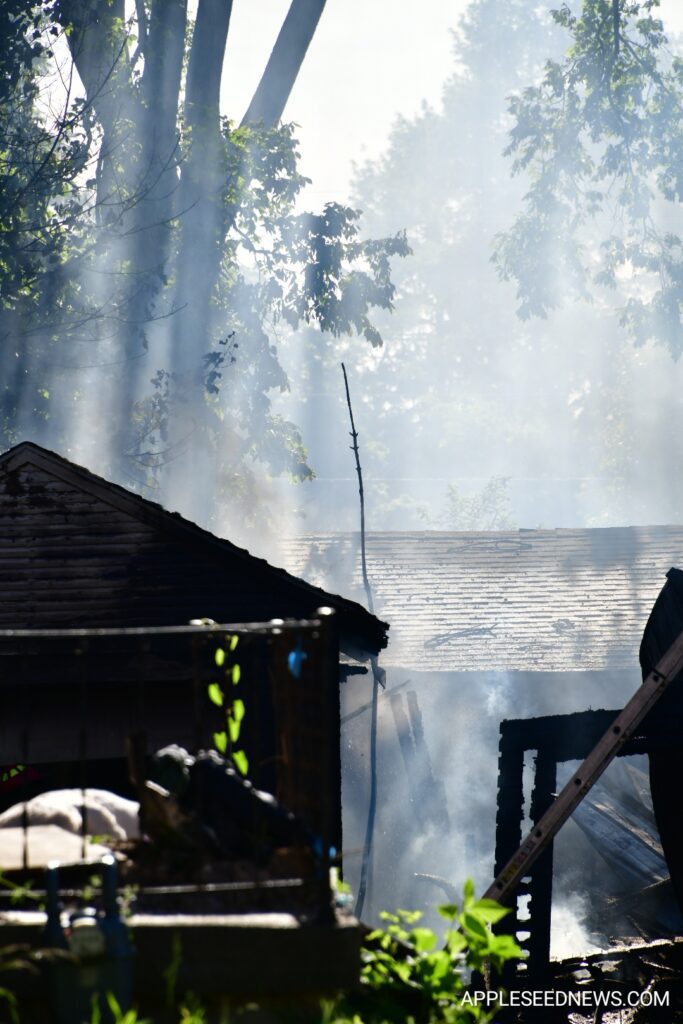 Fire Destroys Garage and Boat on Helen Avenue; Investigation Underway 7